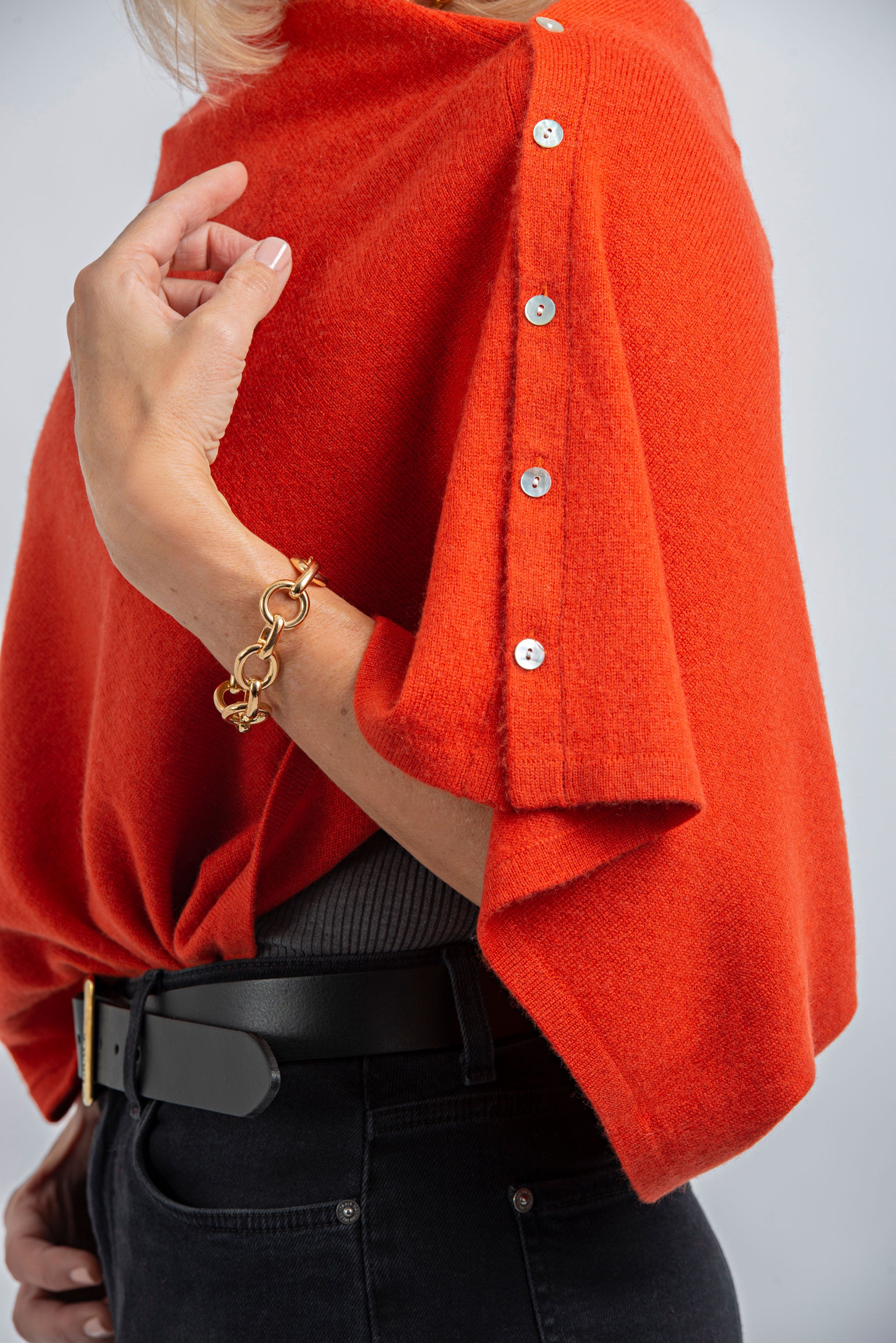 Orange poncho sweater best sale